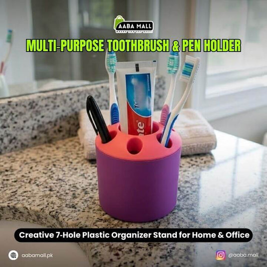Purple multi-purpose toothbrush and pen holder on a bathroom counter with AABA MALL branding.