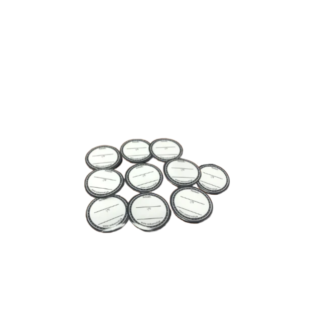 Set of round metallic buttons on a white background