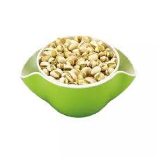 Double dish snack serving bowl in white, filled with shelled pistachios on the top layer, showing the integrated opening for discarding empty shells into the hollow bottom layer.