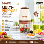 Osaka multi-purpose blender with ingredients and a smoothie on a kitchen counter.
