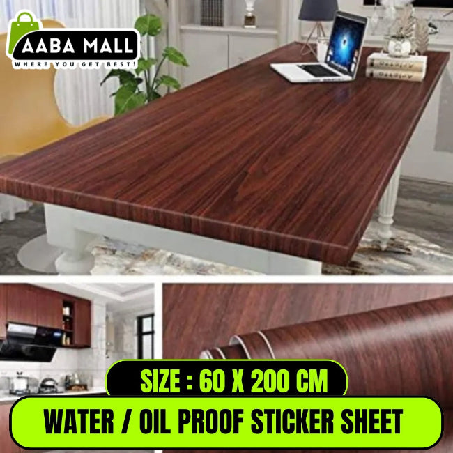 Roll of dark brown wood grain peel and stick wallpaper next to a kitchen countertop it has been applied to. Shows the waterproof, oil-proof, and self-adhesive features.