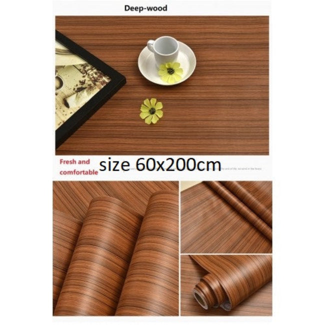 Roll of dark brown wood grain peel and stick wallpaper next to a kitchen countertop it has been applied to. Shows the waterproof, oil-proof, and self-adhesive features.