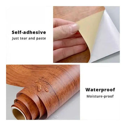 Roll of dark brown wood grain peel and stick wallpaper next to a kitchen countertop it has been applied to. Shows the waterproof, oil-proof, and self-adhesive features.