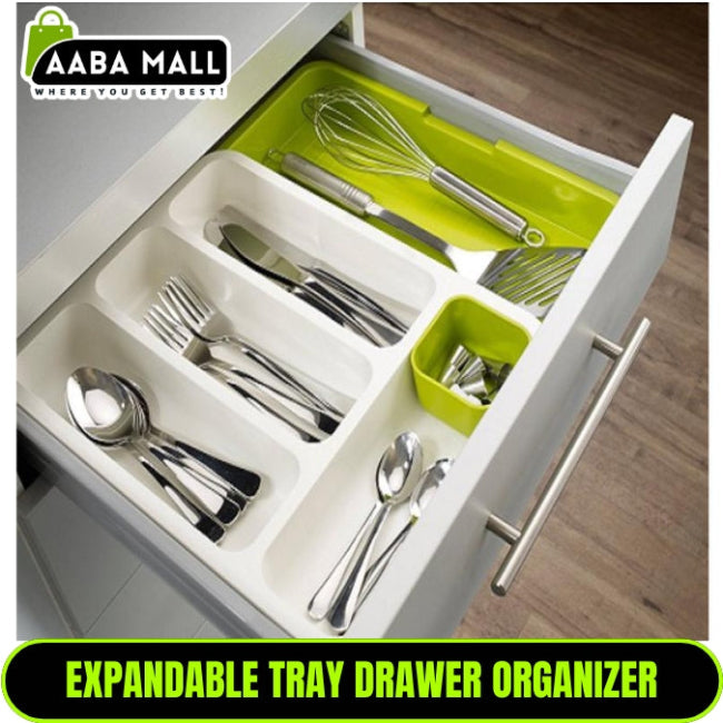 Expandable 2-tier plastic cutlery tray organizer shown fully extended in a kitchen drawer, neatly separating spoons, knives, and forks in the multiple layered compartments.