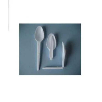 Set of plastic cutlery including a spoon, fork, and knife on a blue background