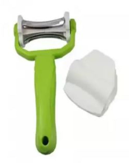 Hand holding a silver stainless steel multi-function peeler with a black ergonomic handle, shown peeling a long strip from a carrot over a cutting board.