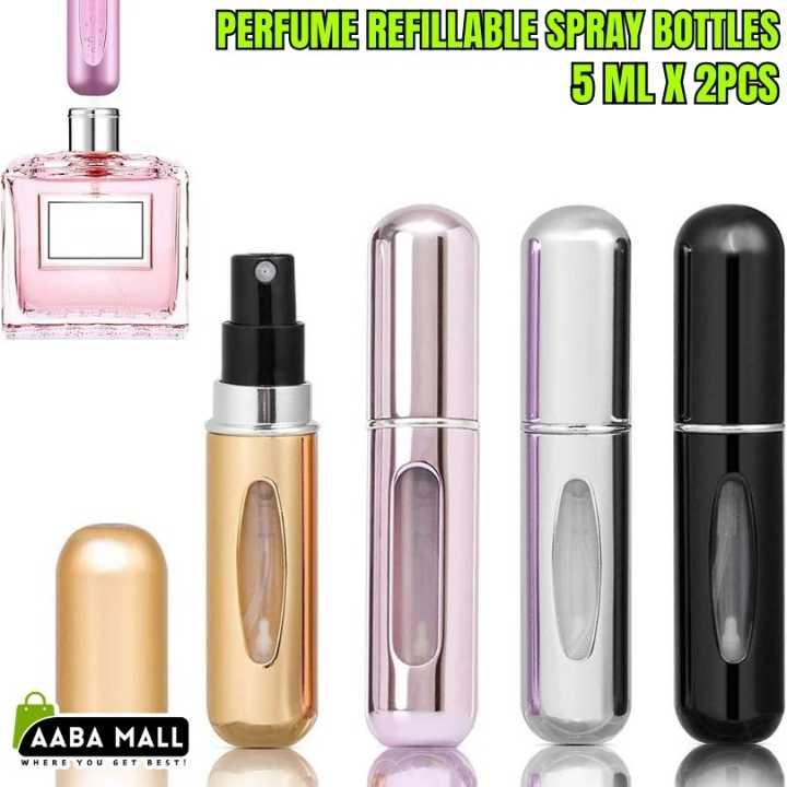 Set of four perfume refillable spray bottles with AABA Mall branding.