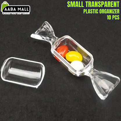 Small transparent plastic organizer shaped like a candy with colorful contents on a black background, branded 'AABA MALL'.