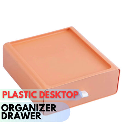 Orange plastic desktop organizer drawer on a white background with text.