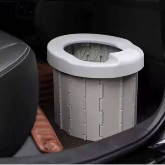 Car cup holder with a gray liner inside a vehicle.