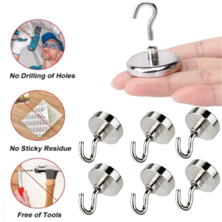 Set of magnetic hooks with a hand holding one, demonstrating no drilling or residue.
