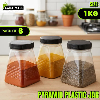 Three pyramid plastic jars with black lids on a kitchen counter, containing different spices.