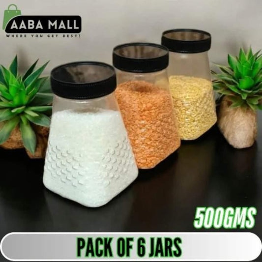 Pack of 6 jars with black lids, containing different substances, on a dark surface with plants in the background. Brand 'AABA MALL' is visible.