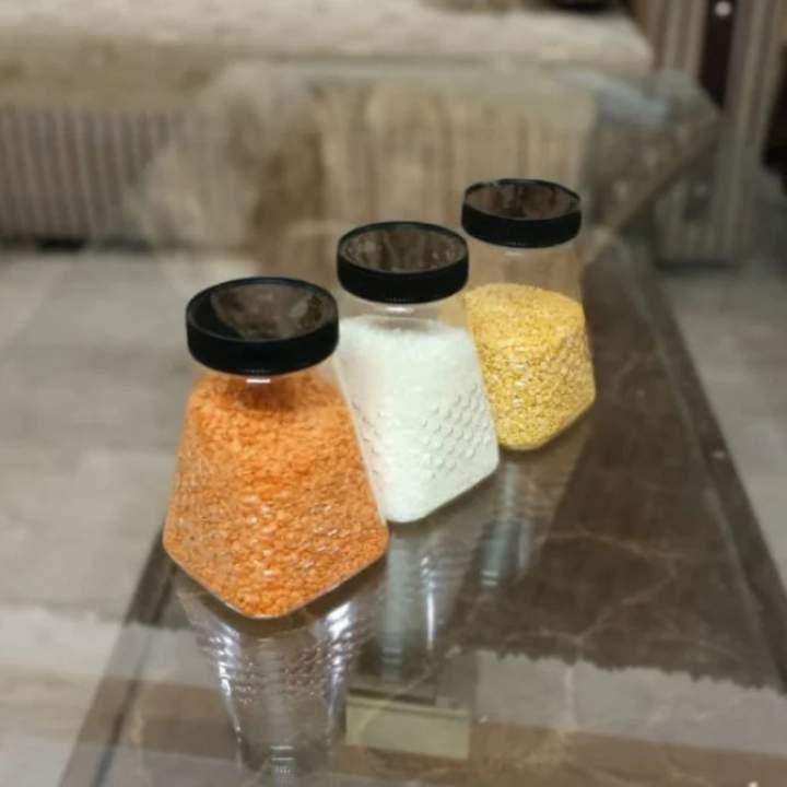 6 Pcs Small Pyramid Design Storage Jar Set (500GMS) with Rack ? Food Grade Plastic Candy & Spice Organizer