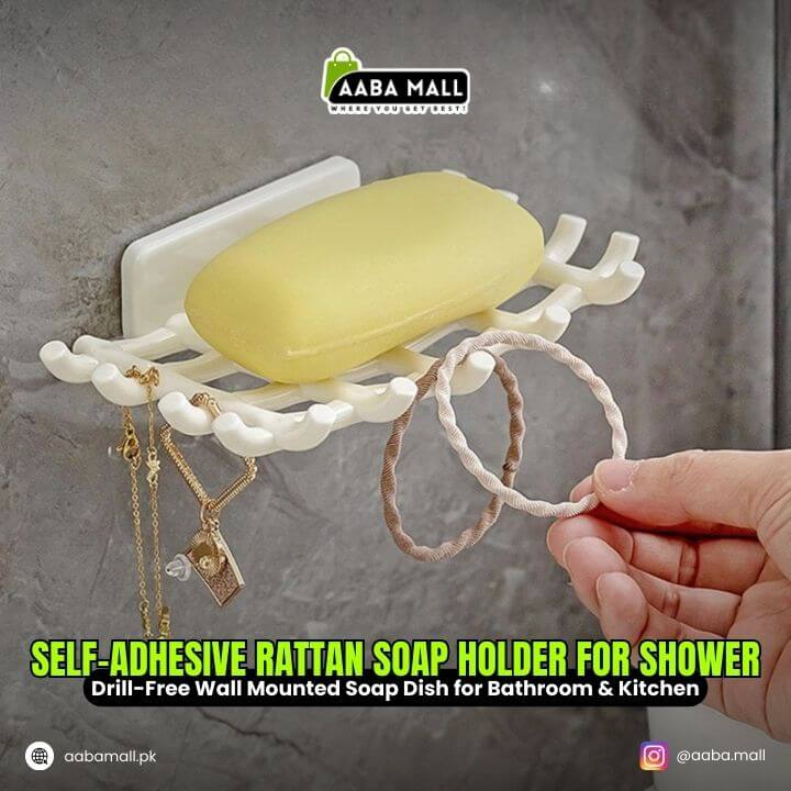 Self-adhesive rattan soap holder with a bar of soap and jewelry on a gray background, featuring AABA MALL branding.