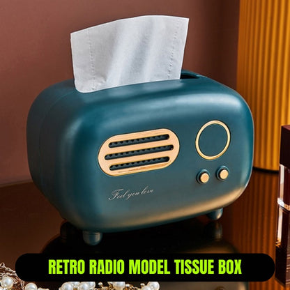 Retro radio model tissue box with tissues on a wooden surface