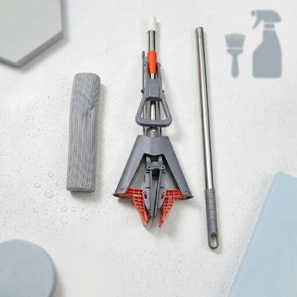 Cleaning tool set with gray and red components on a light surface