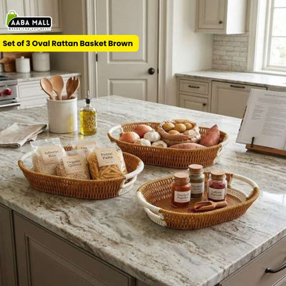 Set of 3 oval rattan baskets on a kitchen counter with Aaba Mall branding.