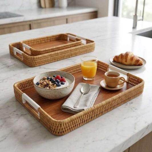 Wooden tray with breakfast items on a marble countertop