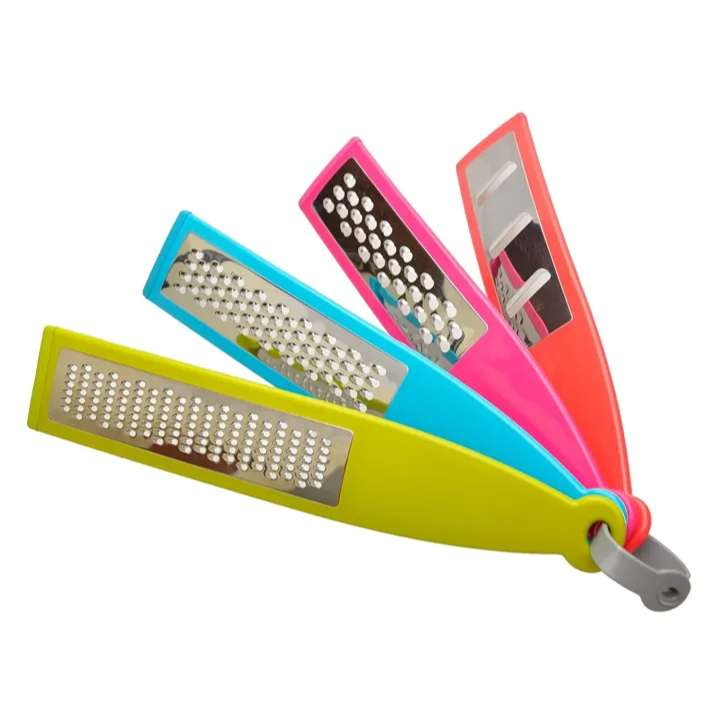 Set of colorful handheld graters on a white background