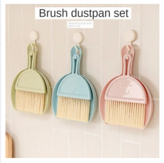 Small broom and dustpan for tabletop and edge dusting