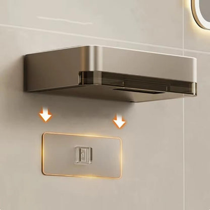 Metallic wall-mounted light fixture on a tiled wall