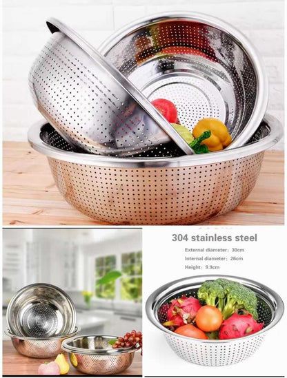 Stainless steel colander with vegetables on a wooden surface