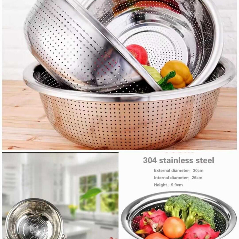 Stainless steel colander with vegetables on a wooden surface