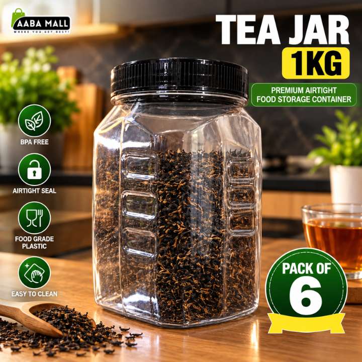 A clear plastic hexagonal tea jar with a black screw-on lid, filled with dark tea leaves, shown on a wooden table in a kitchen setting. The image includes promotional text reading 'TEA JAR 1KG' and feature icons for BPA free, airtight seal, food grade plastic, and easy to clean.