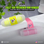Two toilet air freshener rim hangers with colorful labels on a white surface.
