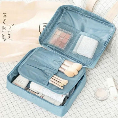 Portable waterproof travel makeup organizer cosmetic bag, open showing internal pockets, unisex toiletry carry case for bathroom storage