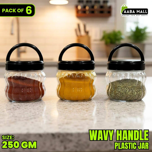 Three glass jars with black lids containing spices on a kitchen counter, labeled 'Pack of 6' and 'Wavy Handle Plastic Jar'.