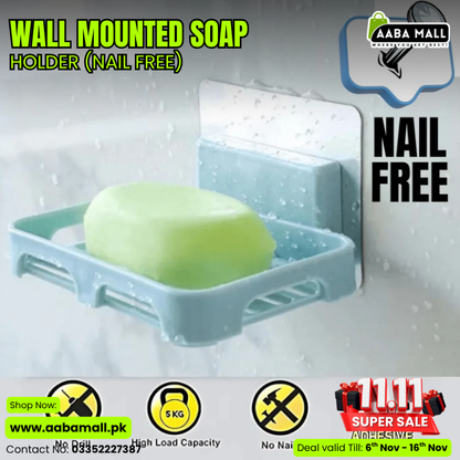 Wall mounted soap holder attached to bathroom tiles