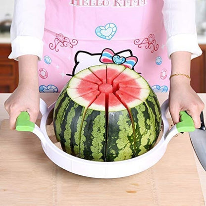 Person cutting a watermelon with a Hello Kitty-themed apron on a wooden table.