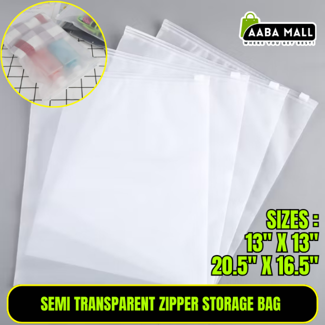 Close-up of a semi-transparent, thickened plastic zipper storage bag filled with folded sweaters, showing the smooth zipper and dustproof material in a closet.