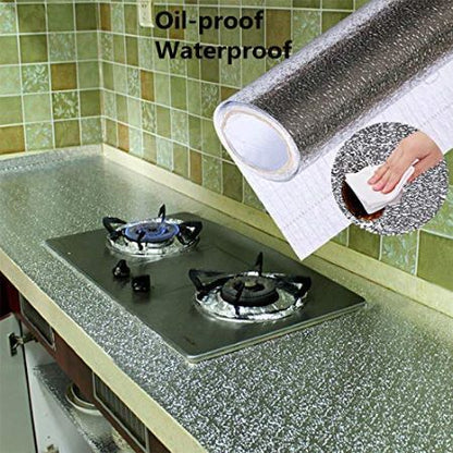 60x200cm aluminum kitchen sticker shown protecting stove and countertop surfaces from oil