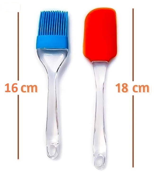 Set of 2 mini silicone kitchen tools (spatula and pastry brush) in blue, shown scraping the remnants of cake batter out of a small mixing bowl, illustrating the compact size.