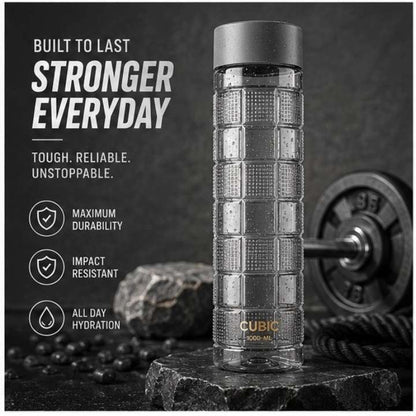 Cubic 1000ML water bottle showing durable square-shaped design with fitness equipment