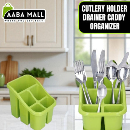 Plastic cutlery holder drainer caddy with multiple compartments, organizing kitchen utensils and tools on a countertop