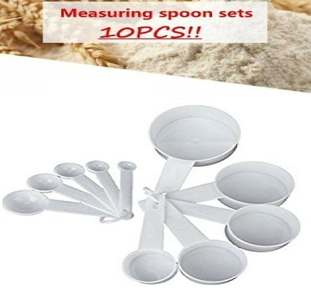 Set of white measuring spoons with text 'Measuring spoon sets 10PCS!!' on a blurred background.