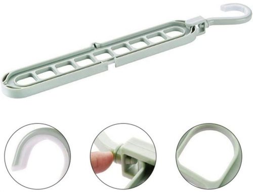 9-hole folding clothes hanger sorting rack shown vertically in a small closet to save space, white organizer