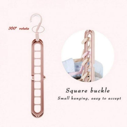 9-hole folding clothes hanger sorting rack shown vertically in a small closet to save space, white organizer