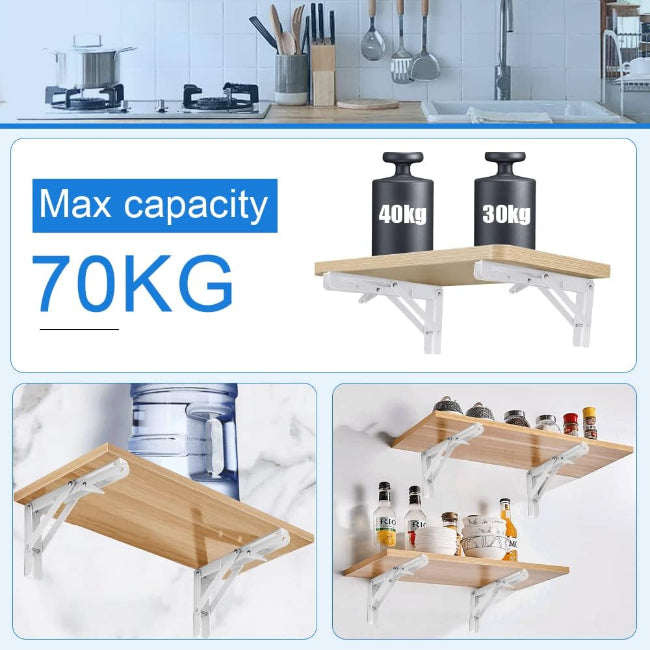 Wall-mounted wooden folding shelf/table in the down position, supported by strong black square steel brackets, used as a small drop-leaf desk in a home office.