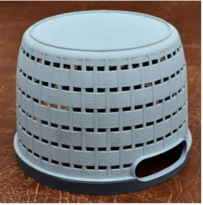 Gray woven stool on a brown surface