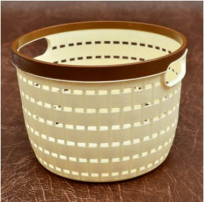 Beige woven basket with brown rim on a brown surface