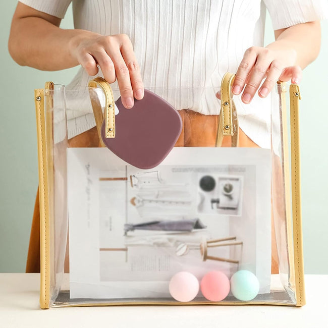 Closed view of a portable jewelry organizer travel box in blush pink, with the lid open showing velvet interior compartments and a built-in mirror.