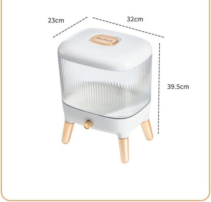 Large 12KG airtight plastic rice and grain storage box with a white lid and transparent body, shown sitting on a kitchen counter next to a scoop, filled with white rice.