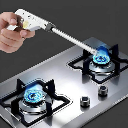 Person using a gas lighter to ignite a gas stove burner.