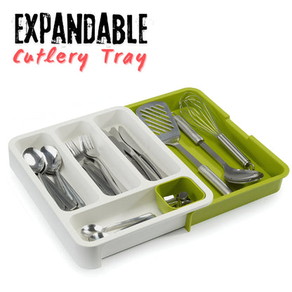 Expandable 2-tier plastic cutlery tray organizer shown fully extended in a kitchen drawer, neatly separating spoons, knives, and forks in the multiple layered compartments.
