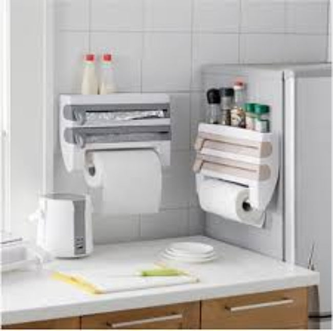 Wall-mounted 4-in-1 kitchen roll dispenser in the White color option, shown holding aluminum foil, plastic cling film, a paper towel roll, and spices on the top shelf.